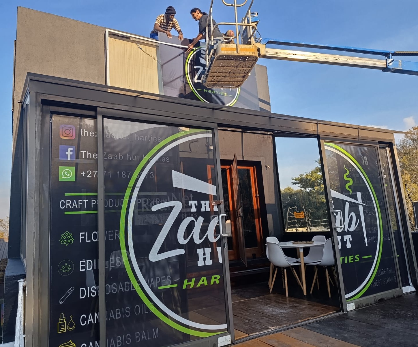 The Zaab Hut Harties storefront windows with full branded vinyl application